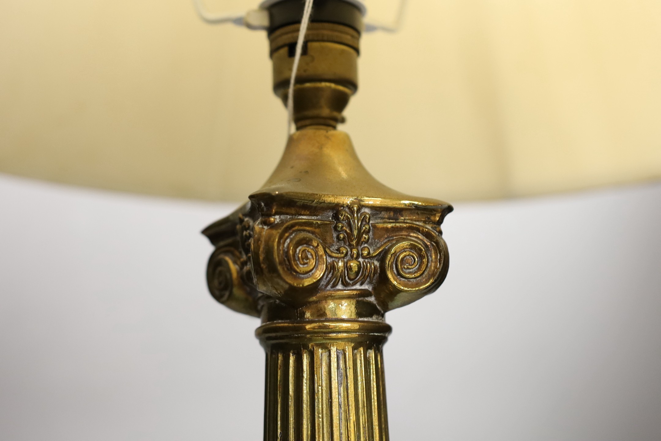 A brass Corinthian column table lamp